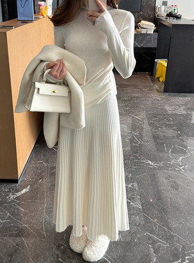 气质甜美设计感坑条白色伞裙2025冬季新款垂感显瘦高腰半身裙长裙