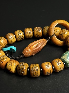 西藏牦牛骨灵骨手串雕刻阿呆尸陀林骷髅头手串仿老搭配佛手男女款