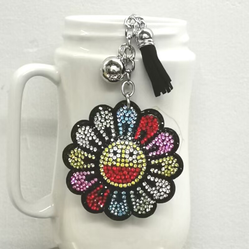跨境热卖流苏镶钻太阳花包包汽车挂件时尚韩国绒烫钻双色水钻钥匙