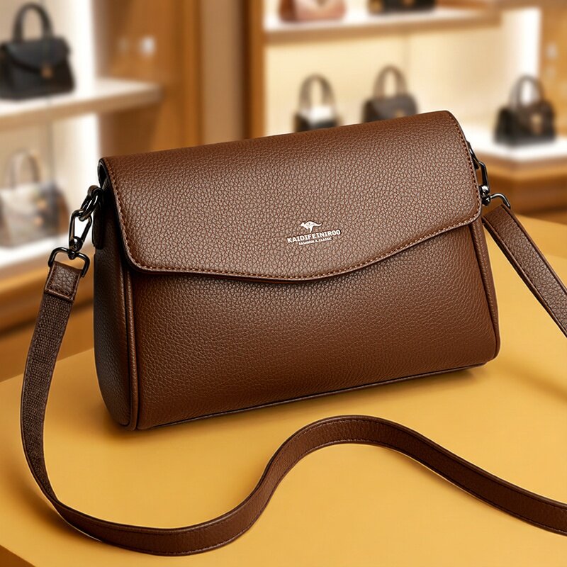 香港真皮女包头层牛皮斜挎包专柜正品2025新款妈妈包高级感大容量