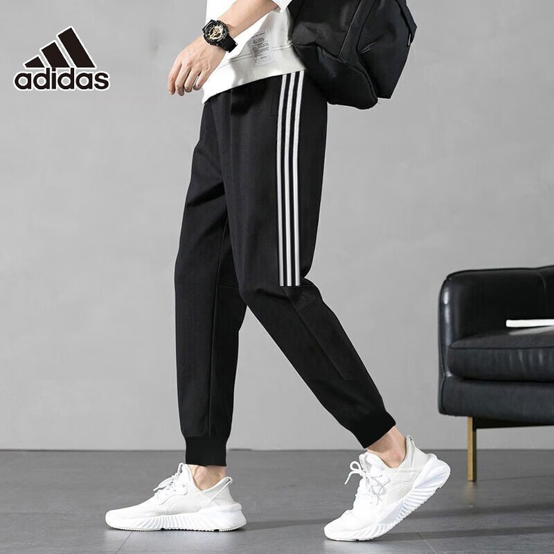 adidas阿迪达斯裤子男2026春季运动休闲跑步针织小脚长裤IA8182