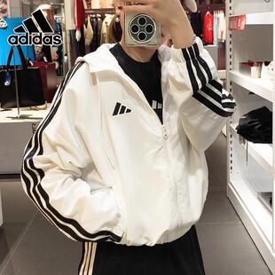 阿迪达斯ADIDAS白色梭织连帽夹克女26新款短款防风运动外套JZ2161