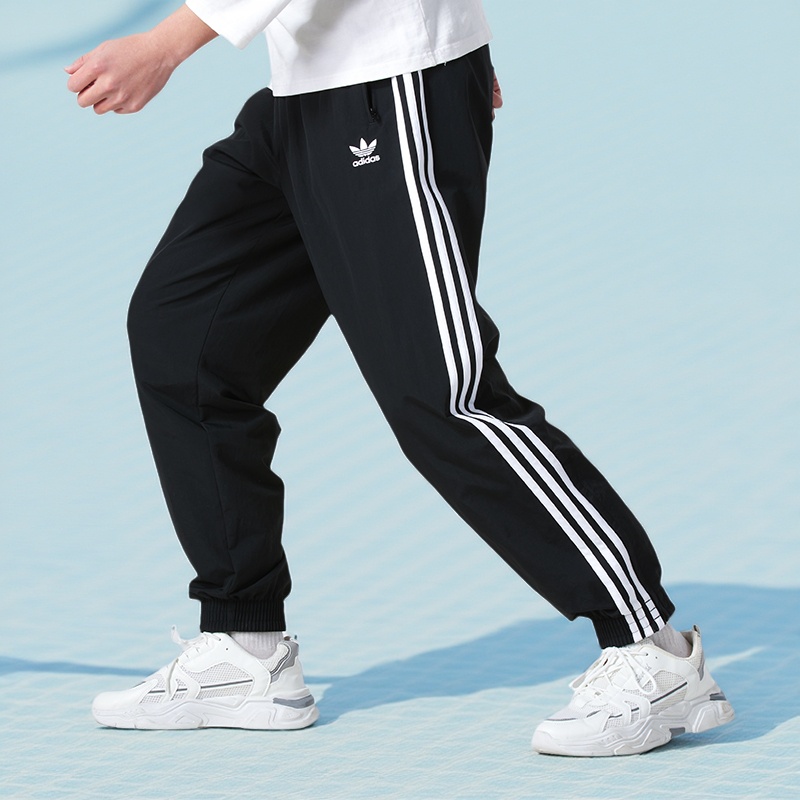 阿迪达斯三叶草束脚裤男款运动裤2025新款三条纹休闲裤长裤KB2465