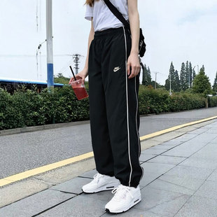NIKE耐克梭织长裤女裤26春新款跑步宽松黑色收口休闲运动裤IM8032