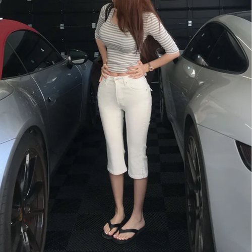今年流行卡普里裤修身牛仔裤女裤脚开叉七分裤口袋休闲弹力中裤夏