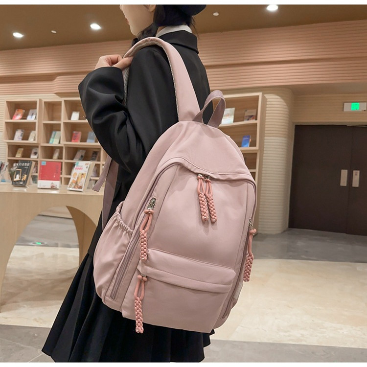 网红户外简约轻便大容量双肩背包