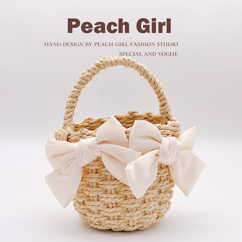 Peach Girl蝴蝶结甜美编织镂空草编包包手提包单肩斜挎包女HD34