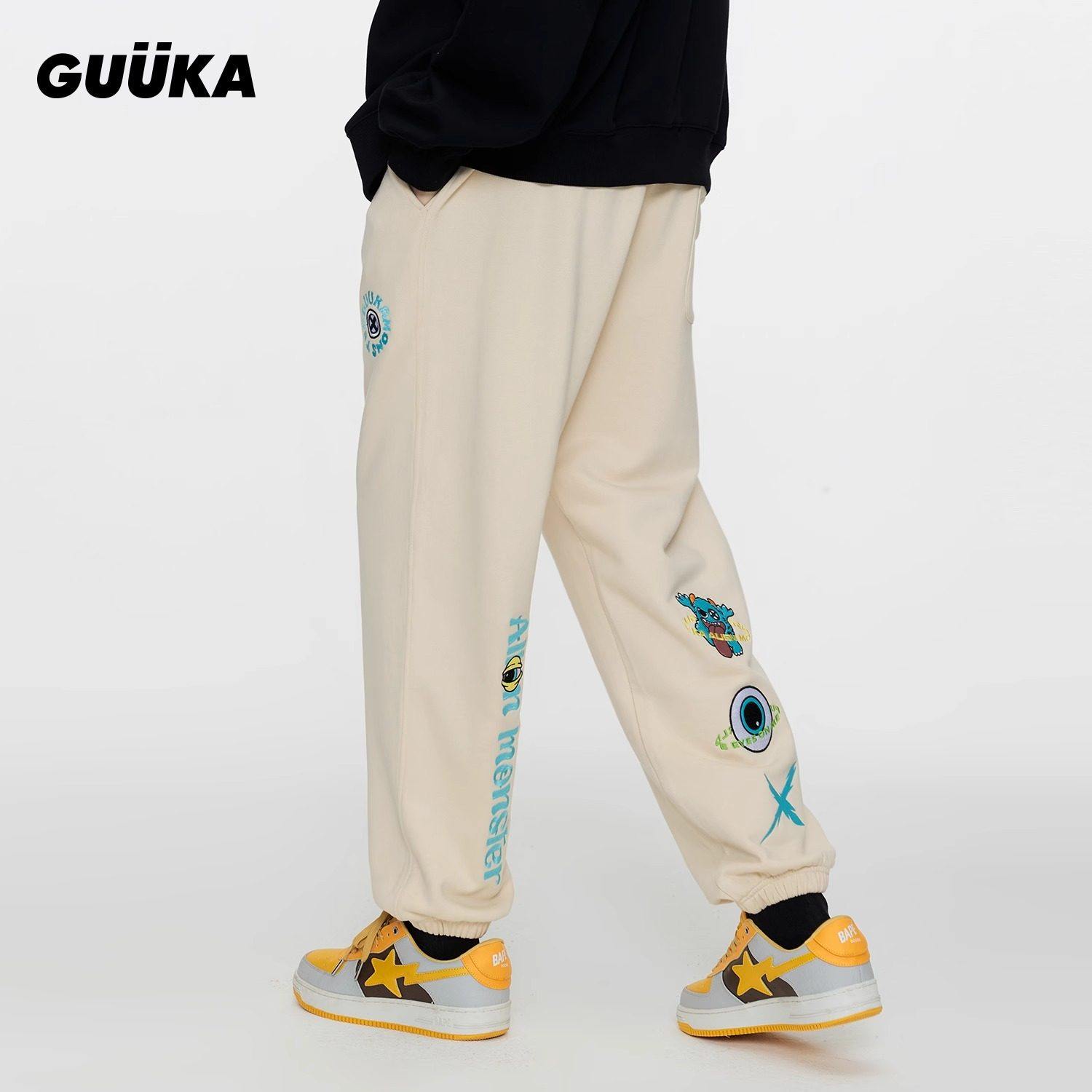 GUUKA嘻哈小怪兽绣花运动裤宽松 浅杏色重磅全棉束脚卫裤男春季潮