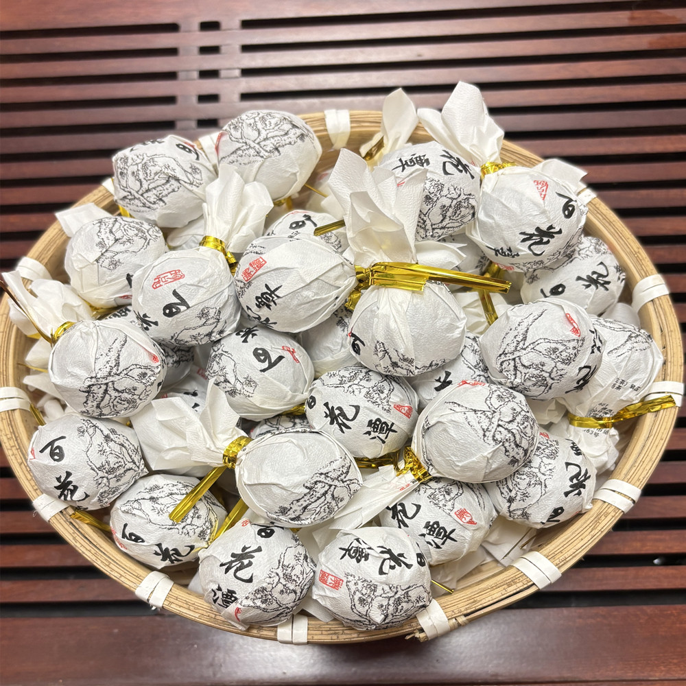 云南易武百花潭头春大树花香蜜韵普洱生茶2025年龙珠