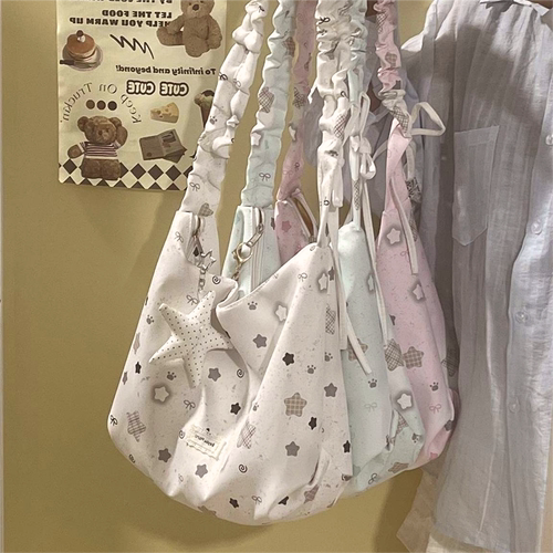 小众设计少女抽绳饺子包百搭学生通勤单肩背包逛街旅行轻便斜挎包