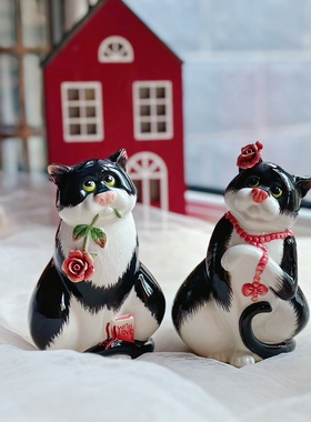 黑色猫咪情侣红色玫瑰花朵