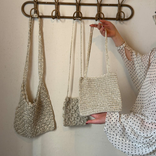 Fever银色包芯线编织花朵贝壳包