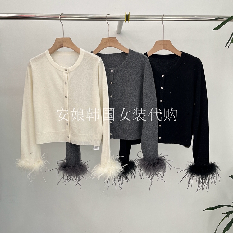 时尚圆领拼接羽毛袖针织开衫