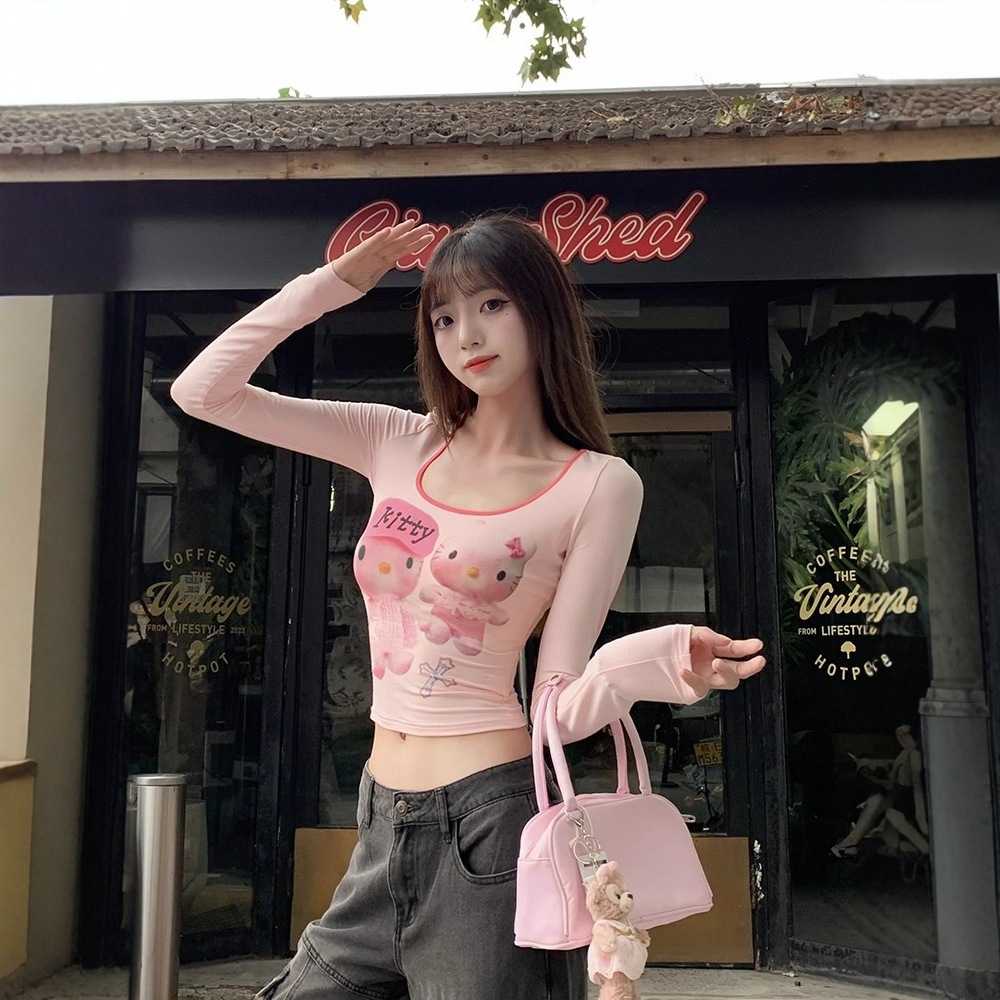 粉色卡通Kitty印花修身长袖T恤女秋季时尚百搭辣妹风上衣