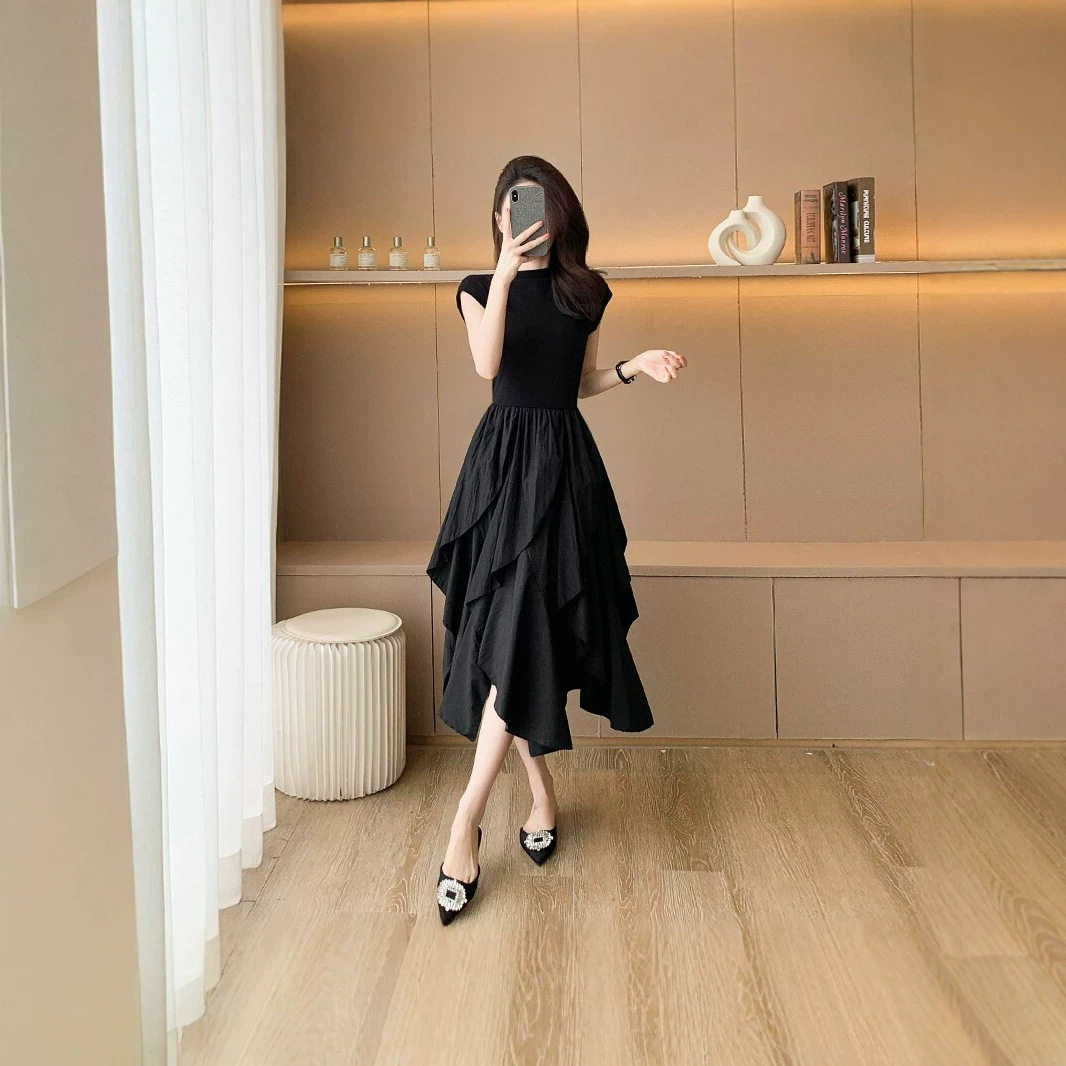 欧洲站黑色无袖连衣裙女2026夏季新款收腰显瘦赫本风不规则长裙子