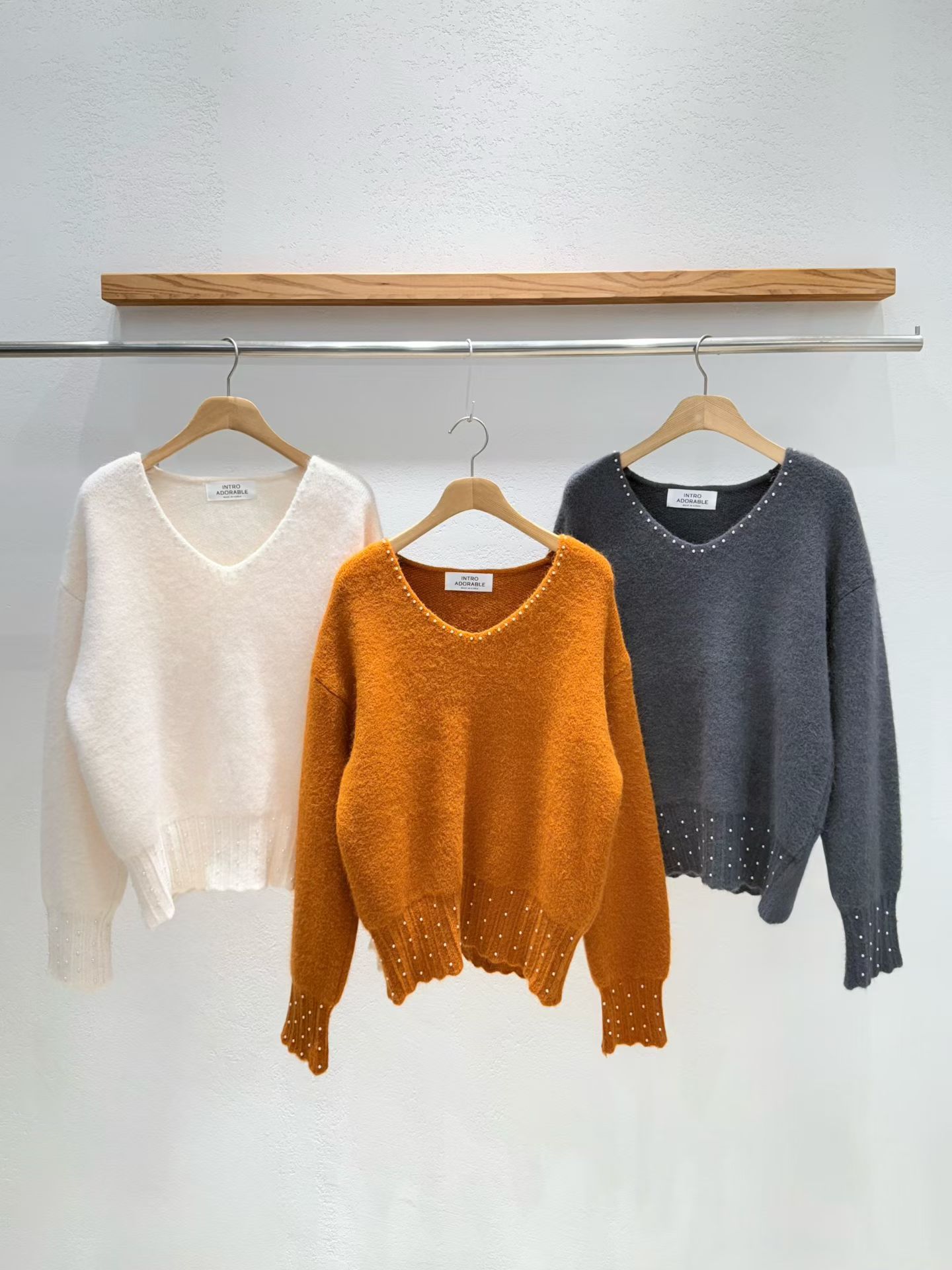 韩国东大门2025冬新款INTRO时尚百搭钉珠V领毛衣