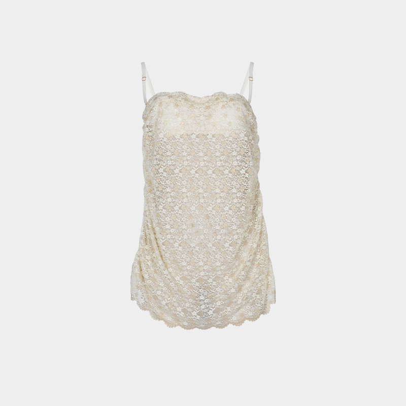 选用精致重工的米金色透视蕾丝面料