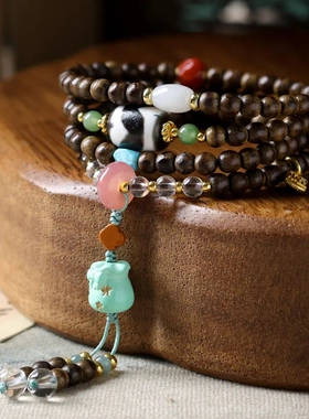 一线黄油沉香木多圈手链菱镁矿松石钱袋南红玛瑙虎牙天珠手串