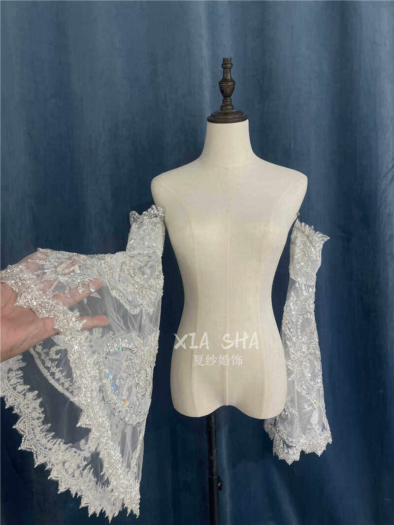 原创珠片婚礼重工奢华喇叭袖子图片