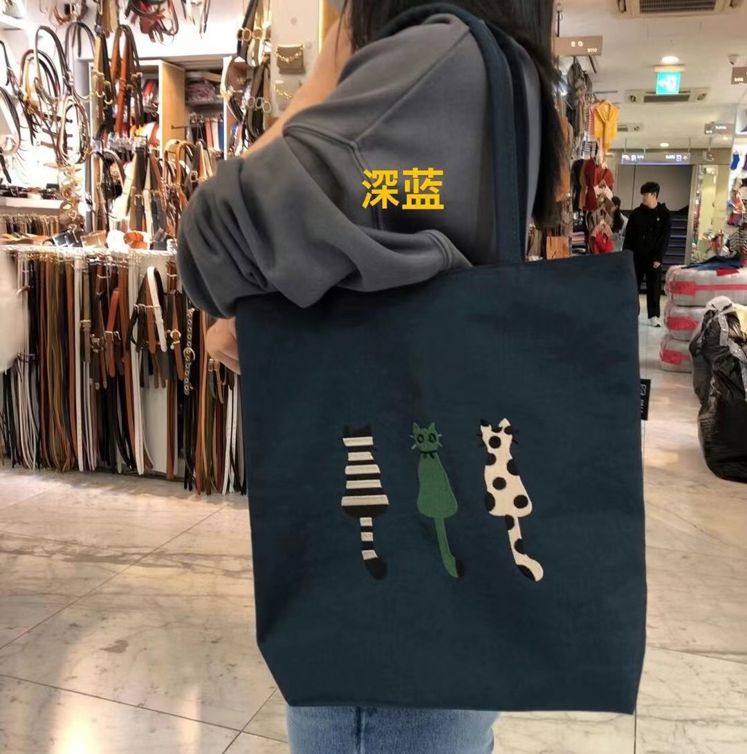 韩国东大门代购wing小众猫咪防水单肩包手提包大容量休闲袋通勤