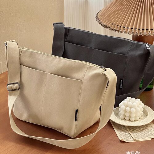 喜凡你日韩纯色简约斜挎帆布包