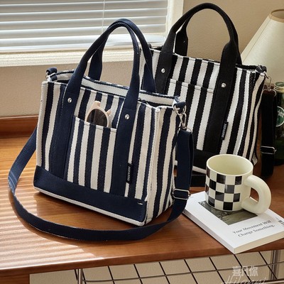 喜凡你日系条纹帆布手提斜挎包
