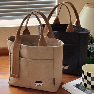 新款日系刺绣小女孩加厚帆布手提包袋文艺日常便携通勤学生餐盒包