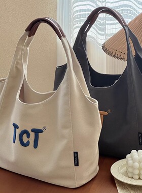 韩系文艺刺绣简约通勤单肩帆布腋下包日常休闲百搭学生手提托特包