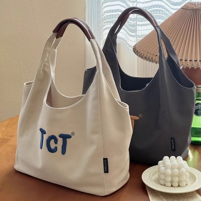 喜凡你韩系刺绣通勤帆布腋下包