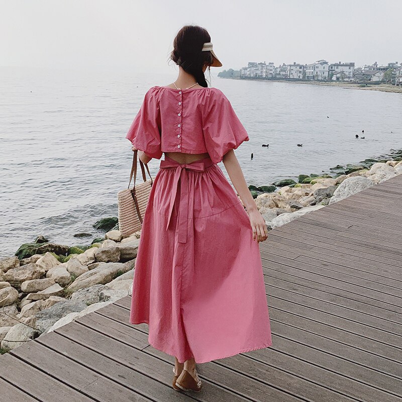 玫红色连衣裙女夏季2025新款后背露腰设计感气质显瘦桔梗法式长裙图片