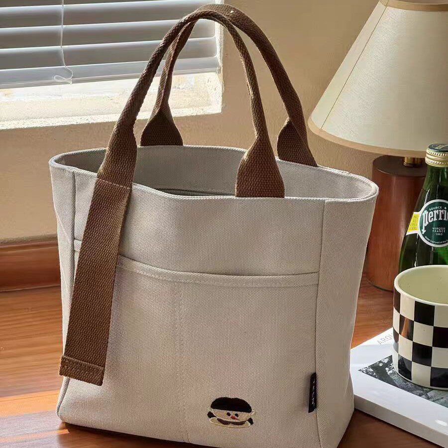 大容量托特通勤女式新款日系2025刺绣帆布包帆布手提包轻便