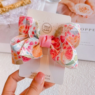 春夏儿童蝴蝶结发夹可爱清新甜美宝宝发卡扭扭立体夹子女孩发饰品