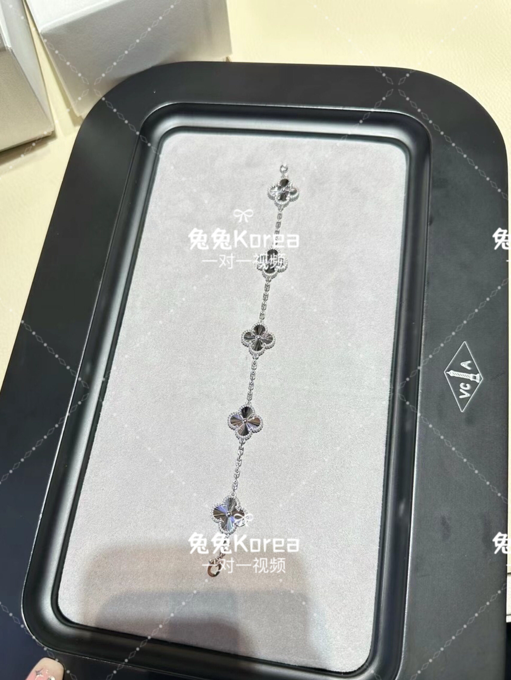 VCA Van Cleef & Arpels white gold laser multifloral bracelet