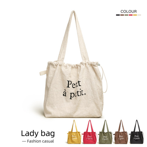 高级感亚麻帆布包女抽绳单肩包