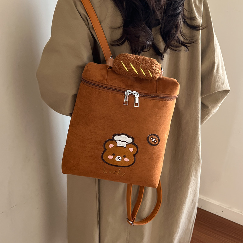 日系可爱卡通面点小熊双肩包女超好看的小书包2026新款麂皮绒背包