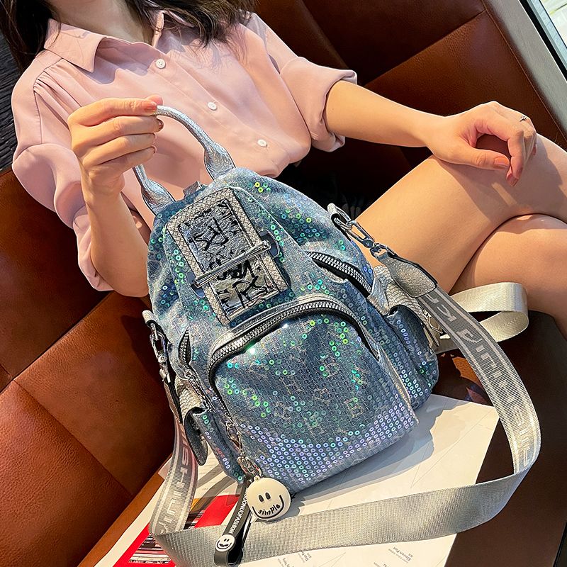 牛仔布双肩包女2025新款韩版亮片流行爆款背包大容量旅行包超火潮