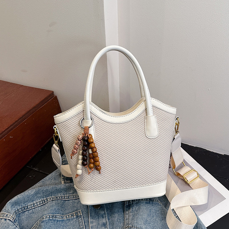 小众设计水桶包女2026新款初春百搭手提单肩斜挎包高级感菜篮子包,箱包皮具/热销女包/男包,水桶包,淘宝优惠券,粉丝福利购,淘宝优惠卷