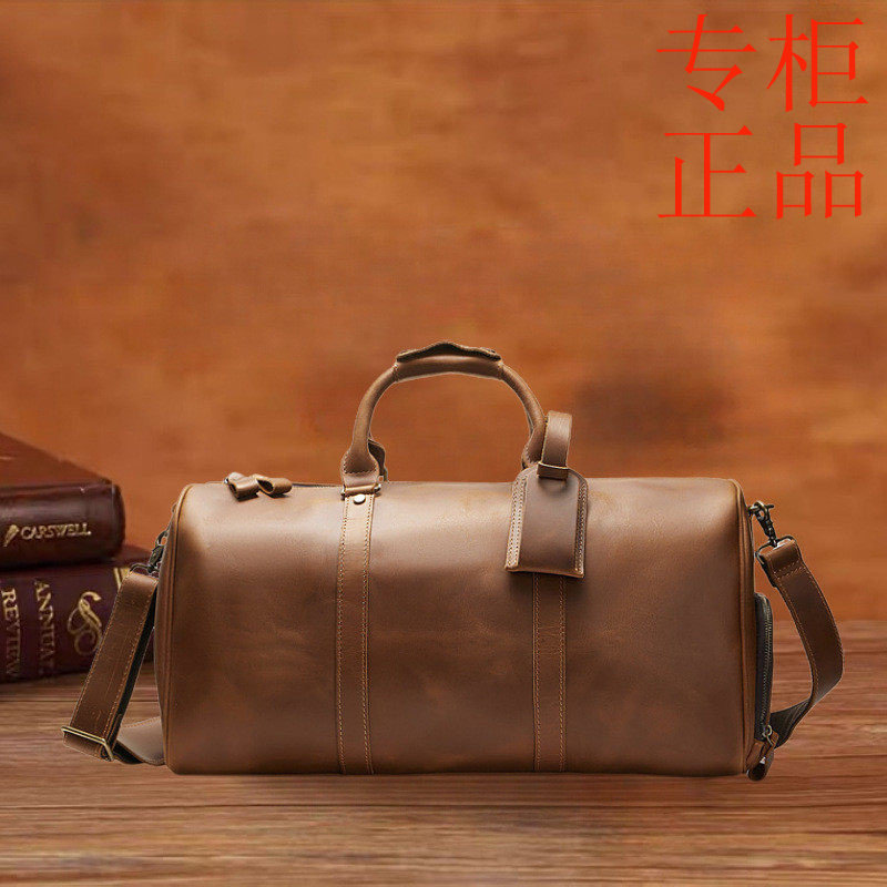 ㊣真皮手提旅行包大容量耐磨带鞋仓旅行袋休闲便携潮流斜挎包男