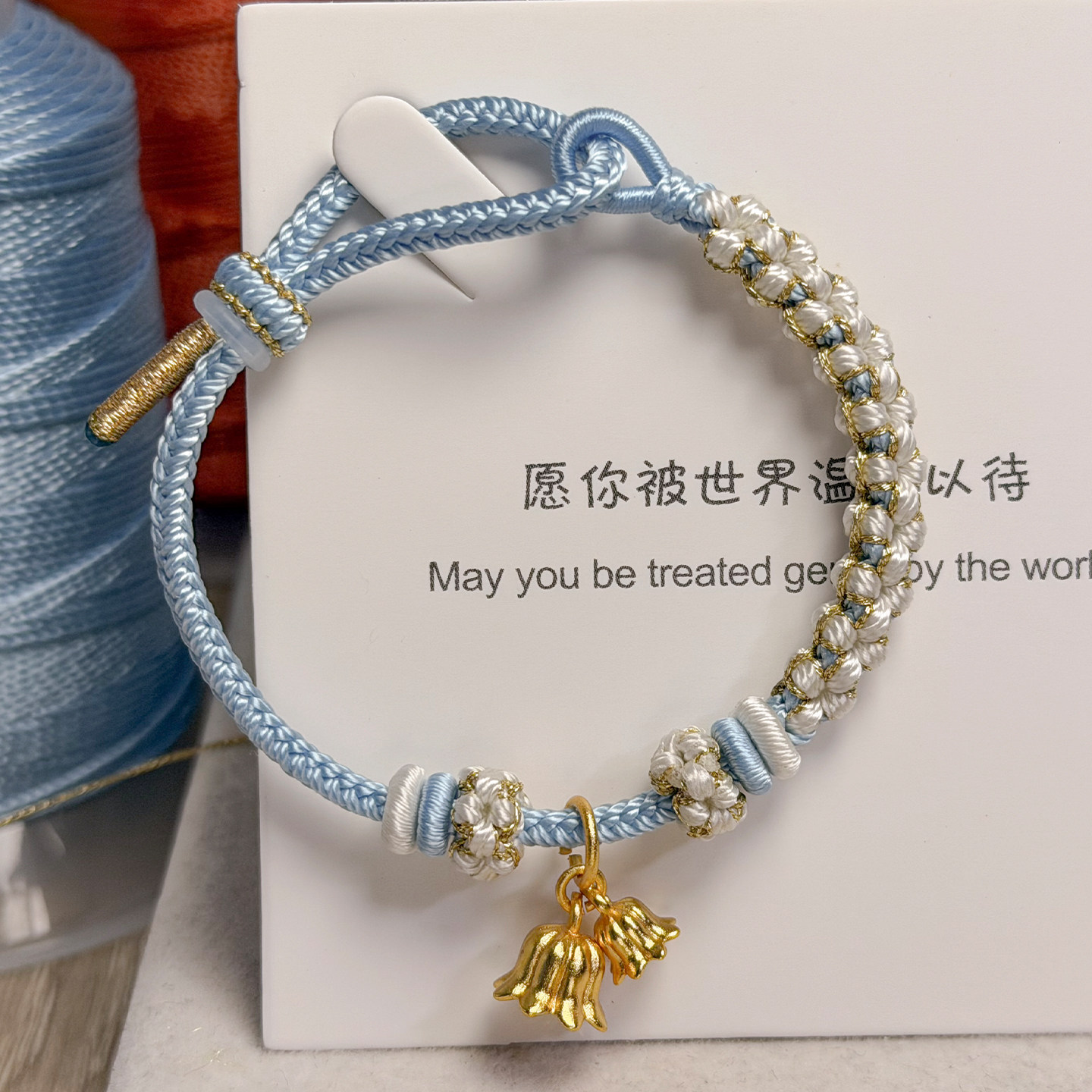 显白蓝色桃花结手绳手工编织绳图片