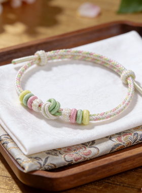 手工编织绳酒窝结黄金转运珠手链