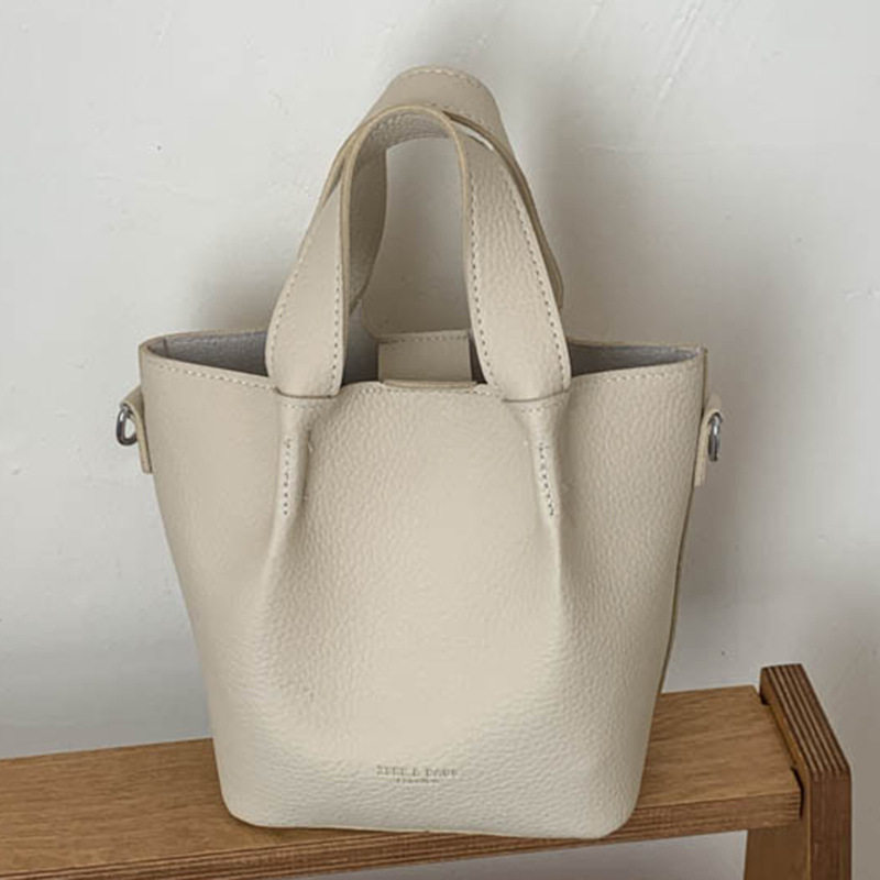 小众复古包包女式2026新款时尚高颜值通勤女包手提单肩斜挎水桶包,箱包皮具/热销女包/男包,水桶包,淘宝优惠券,粉丝福利购,淘宝优惠卷