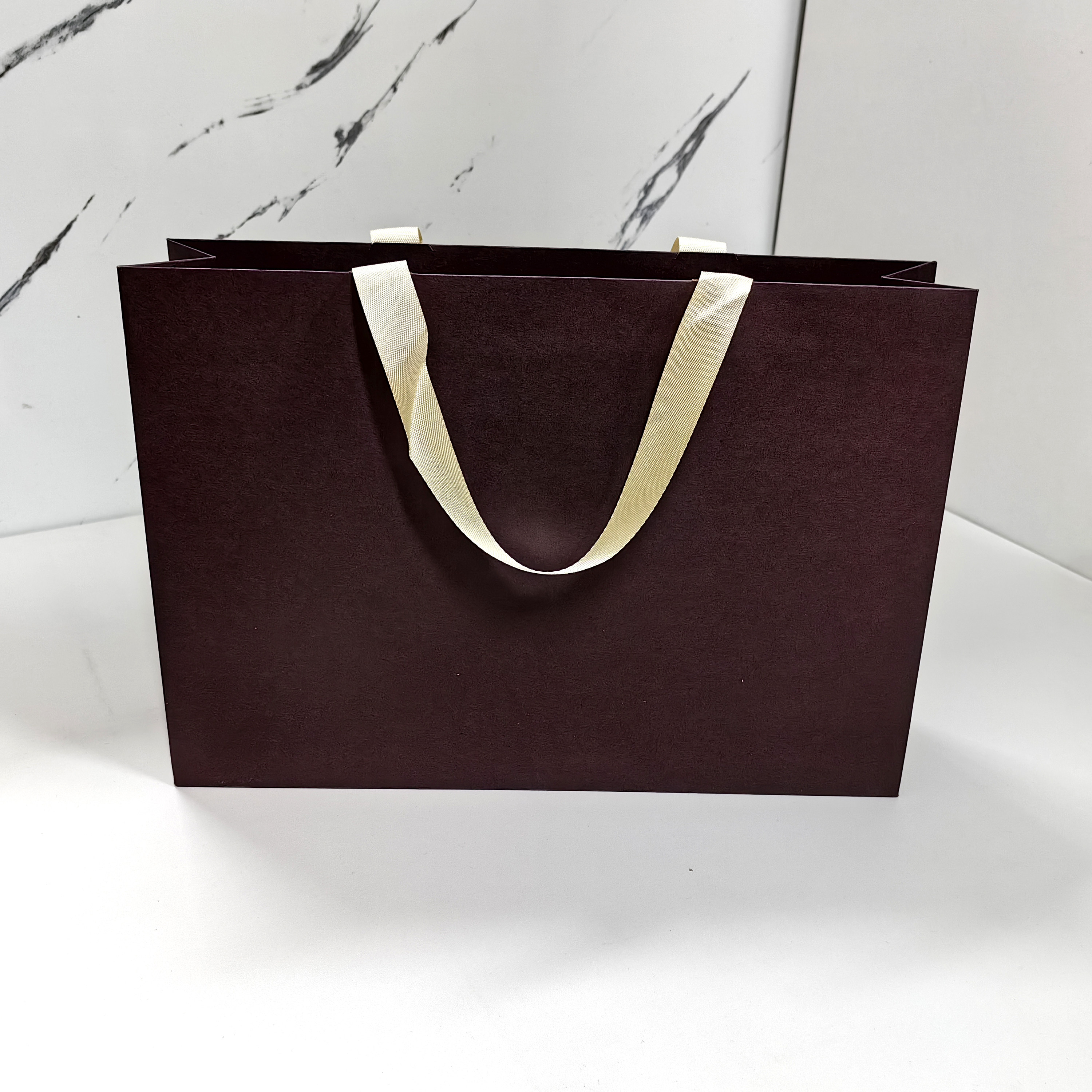 高颜值手提袋订制logo牛皮纸礼品袋定制纸袋工厂通用开业活动服装