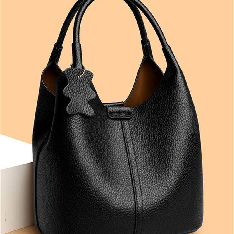 真皮女包2025新款时尚百搭单肩斜挎包高级感小众设计手提水桶包包,箱包皮具/热销女包/男包,通用款女包,淘宝优惠券,粉丝福利购,淘宝优惠卷