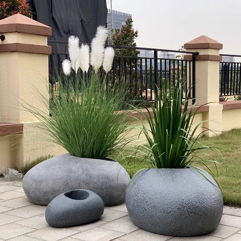 大型椭圆形仿石头花盆北欧室内外玻璃钢异形鹅卵石仿真植物盆摆件