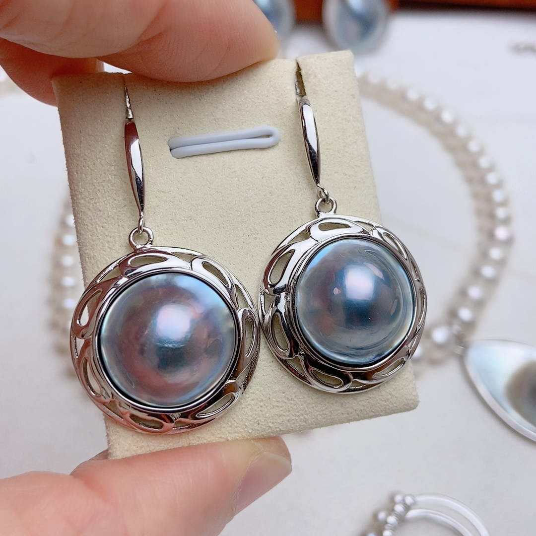 炫彩蓝色海水马贝耳环，镂空包边