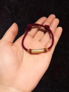 21乘5m999足银镀金心某经弯管配手编红绳先戴金后戴银