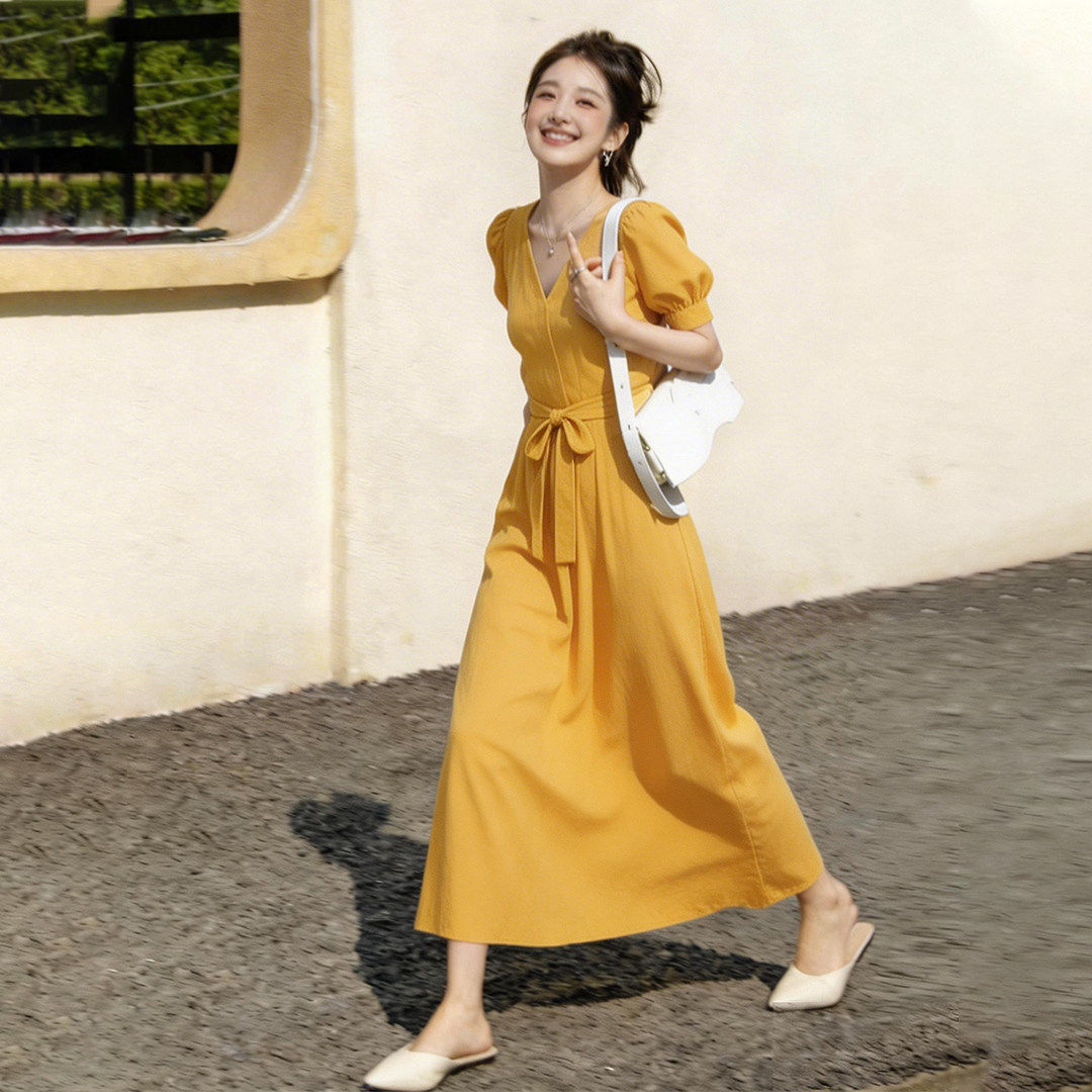 法式黄色泡泡袖收腰连衣裙女夏2026新款高级感大方得体绝美长裙子