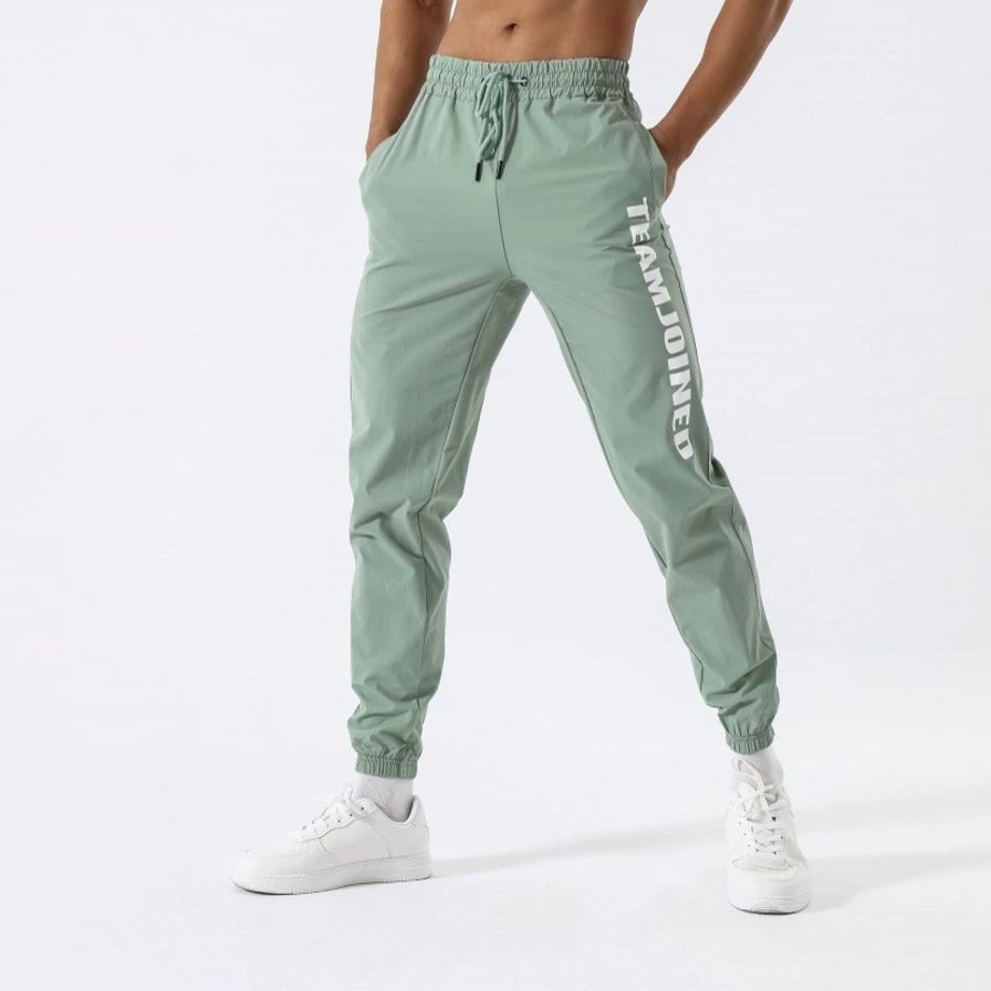 春夏运动长裤男士锦纶四面弹收口裤休闲跑步健身训练宽松束脚卫裤