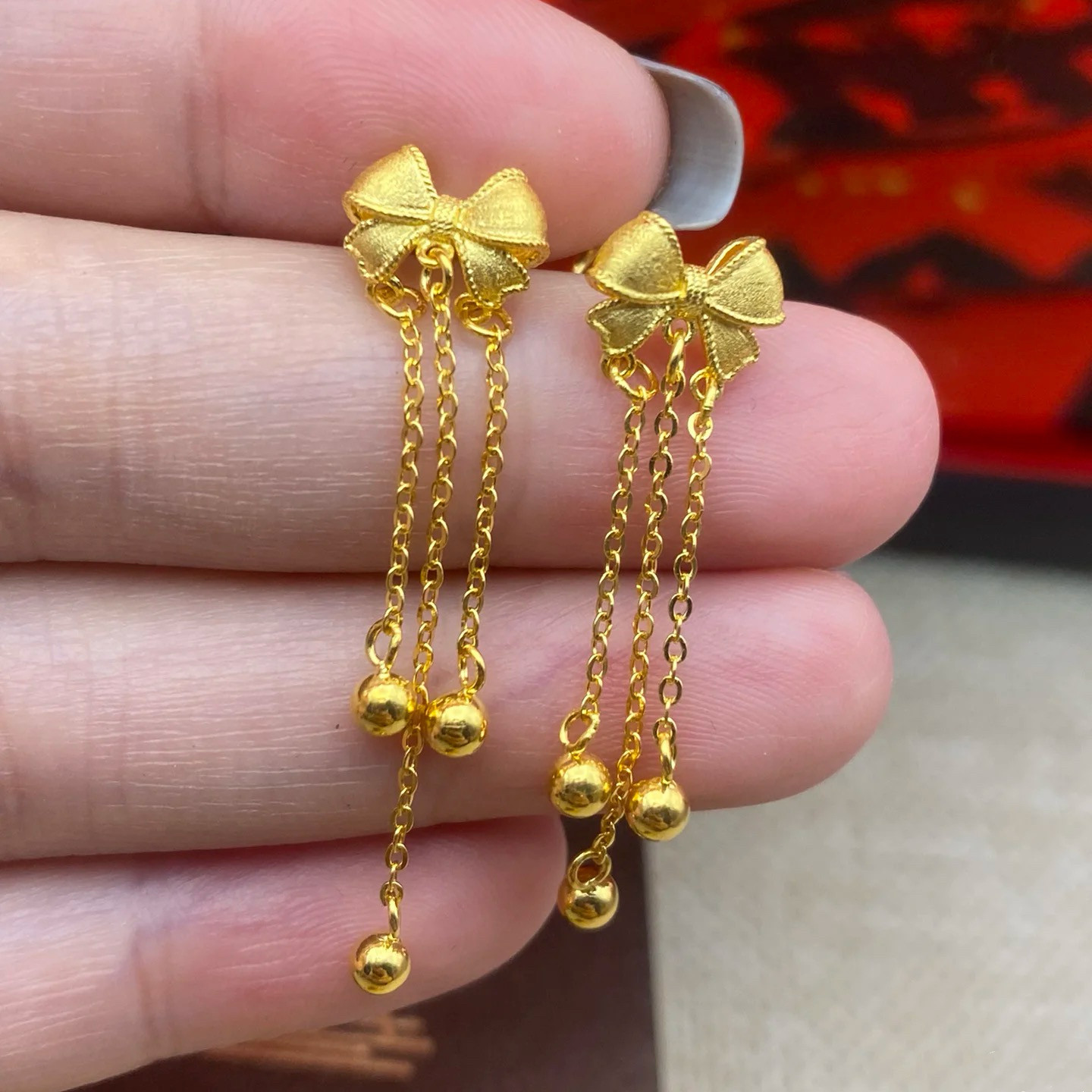 蝴蝶结流苏沙金耳针彷真