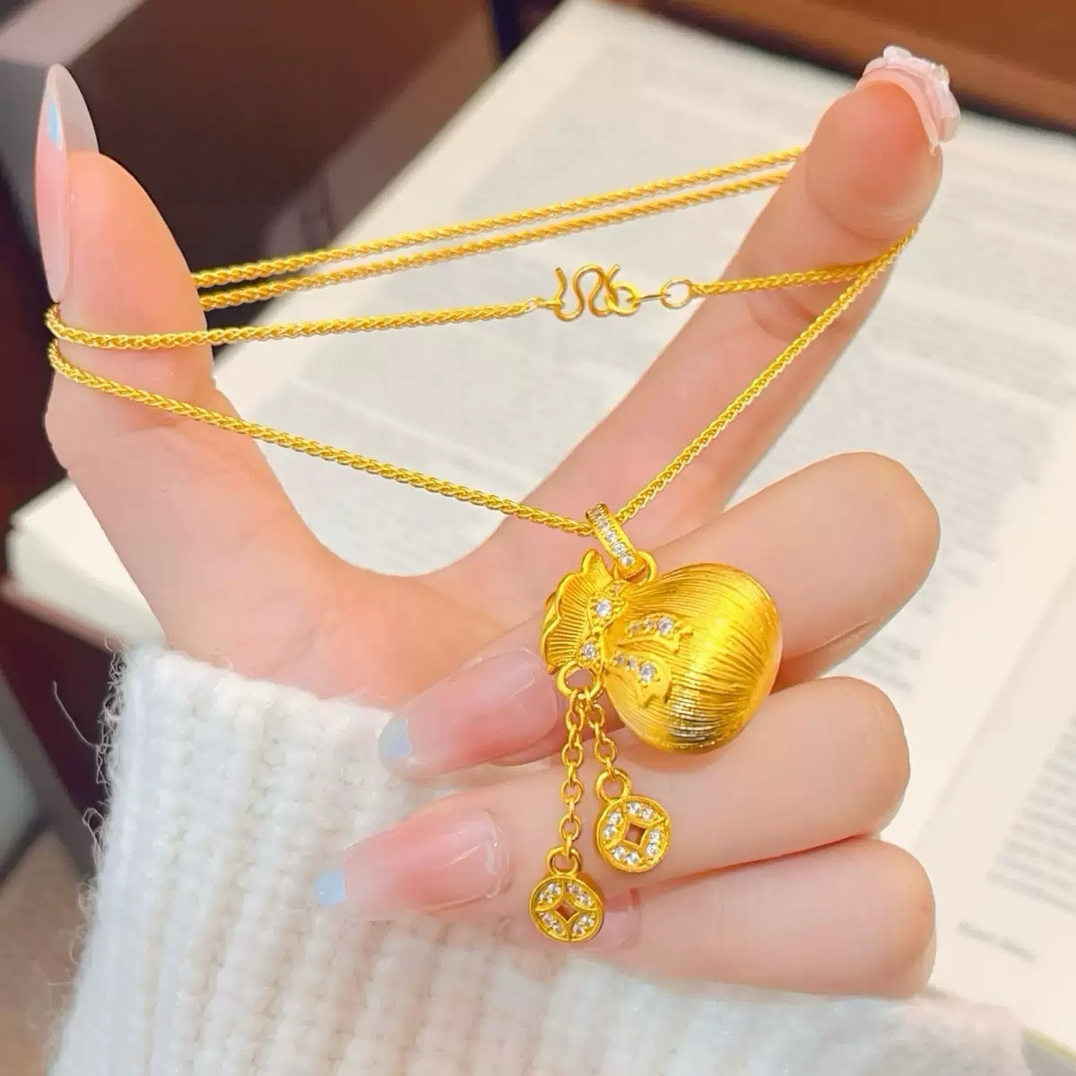 蝴蝶结钱袋子沙金吊坠仿